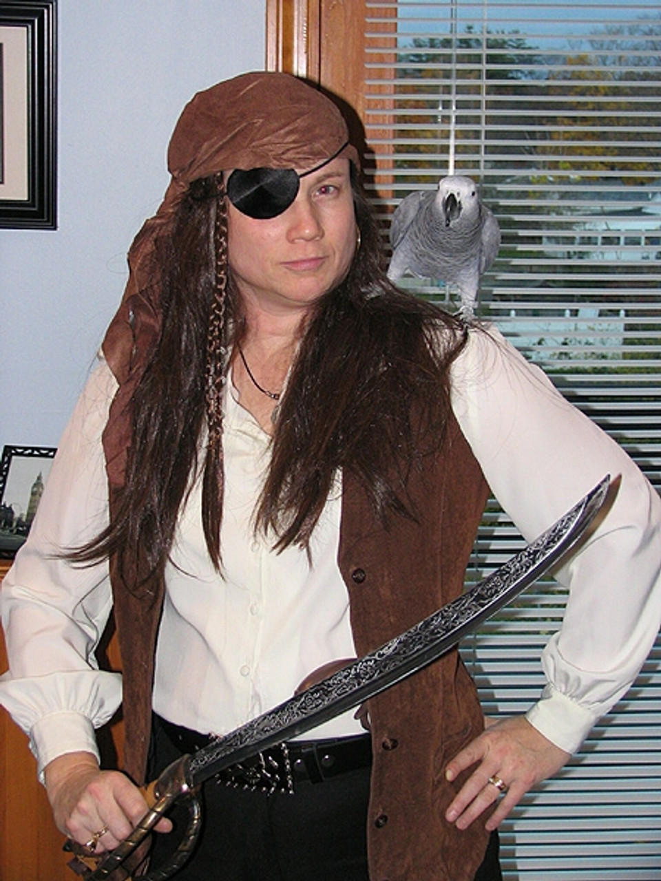 Kira, the African Grey and her pirate family dress